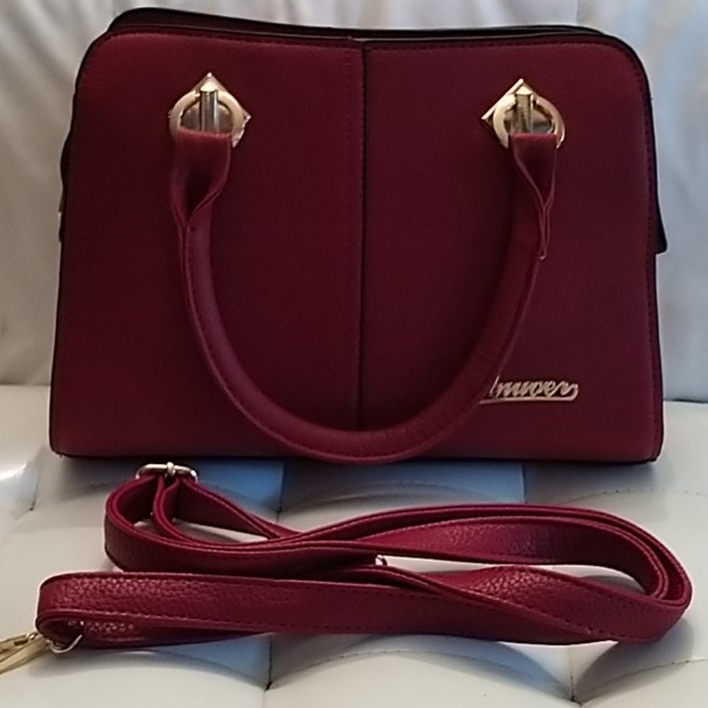 Red faux leather hand vag